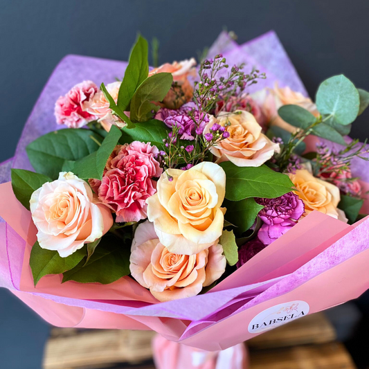 Peach and Pink Rose Bouquet with greenery by Babsela Florist, ideal for gifts in Beckenham